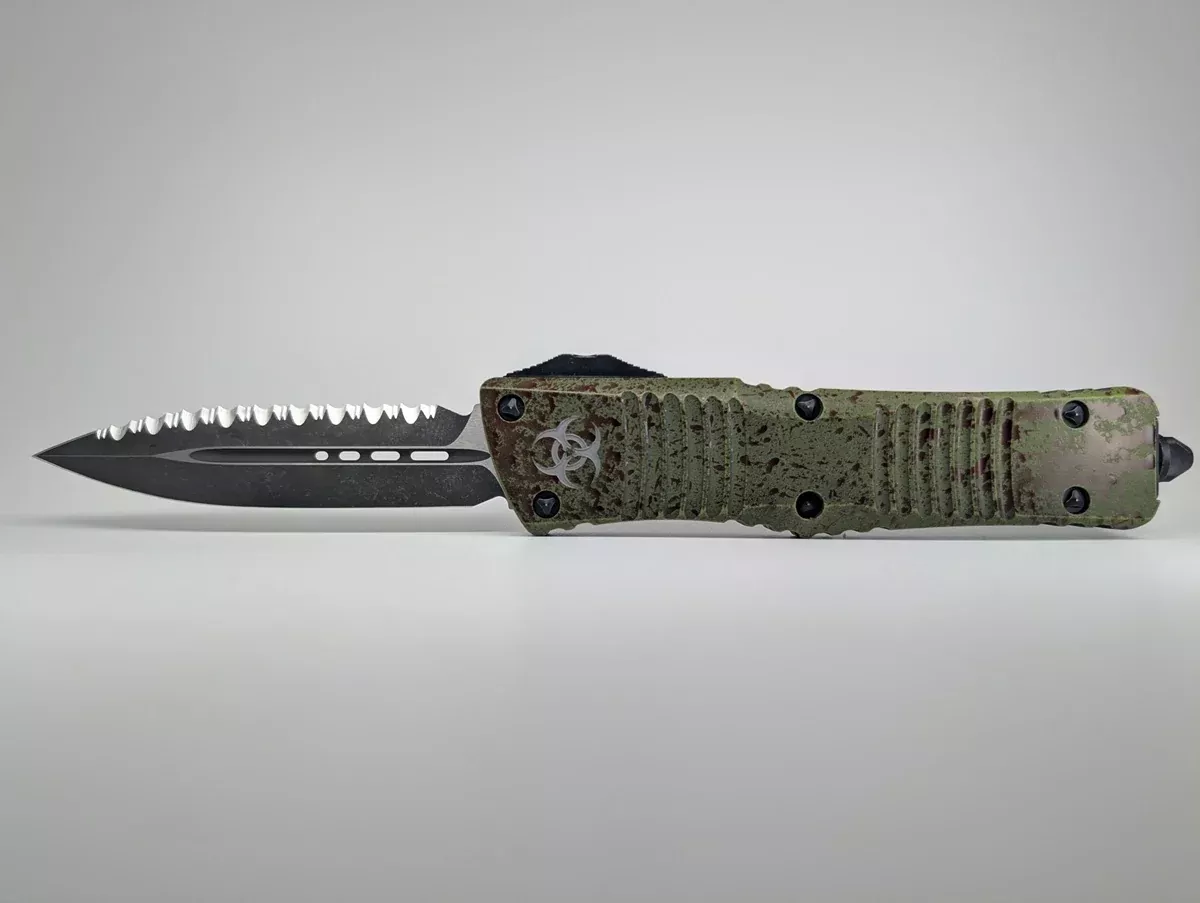 *Consignment* Microtech Combat Troodon D/E Outbreak Signature Series Deep Engraved Full Serrated Out the Front Knife
