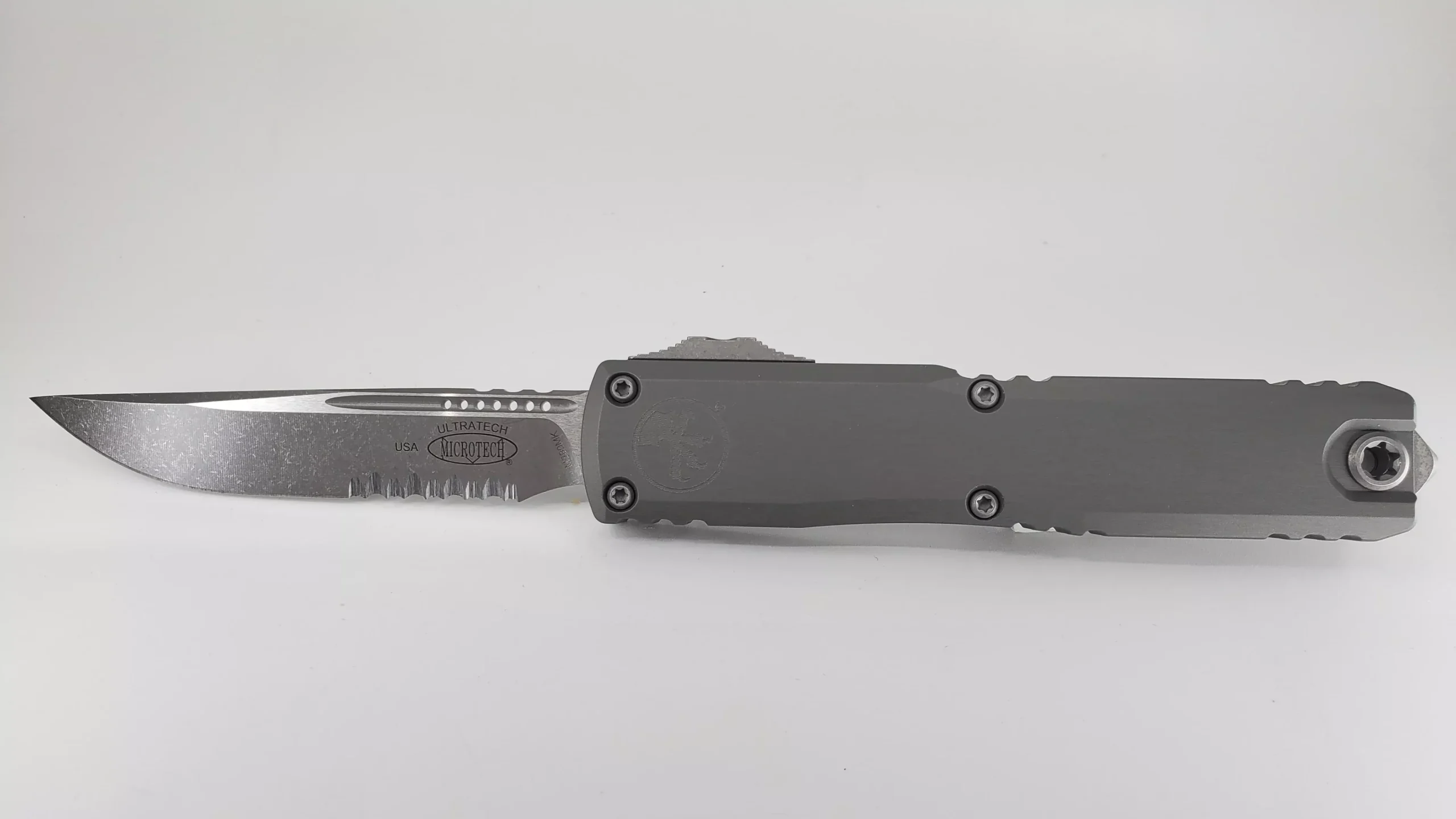 Microtech Ultratech ZBP S/E Natural Clear Apocalyptic Partial Serrated Out the Front Knife