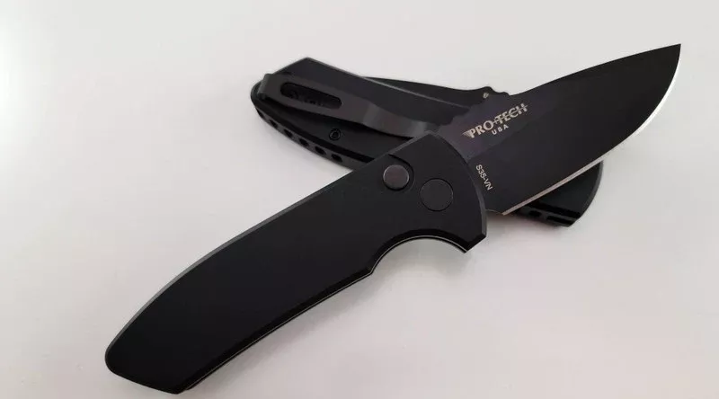 Protech Left Hand Rockeye Smooth Handle Black Blade Auto Folder